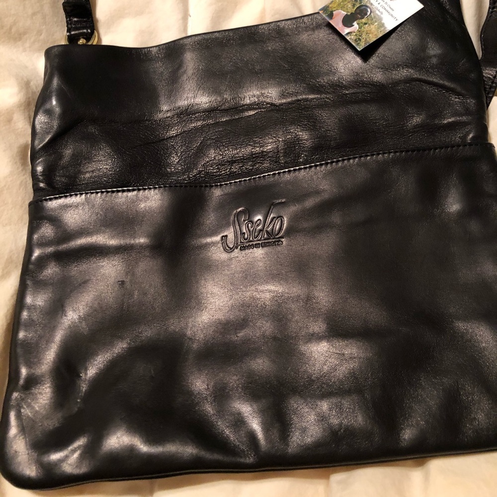 Sseko fold over crossbody clutch black leather